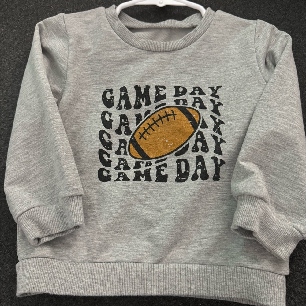 Footballs sweater